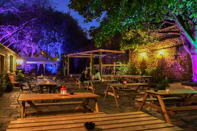 the Pomfret Arms garden at night